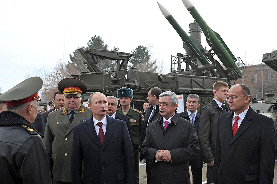 Russian President Vladimir Putin and Armenian President Serzh Sargsyan (both in center) visit the Russian 102nd military base near Gyumri, Armenia, in early December 2013. The Russian base is less than 10 kilometers from the Turkish border.